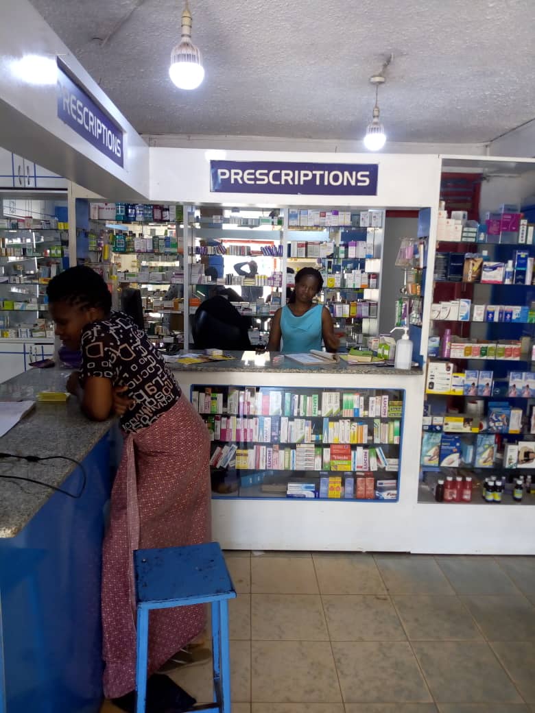 Women behind a pharmacy counter