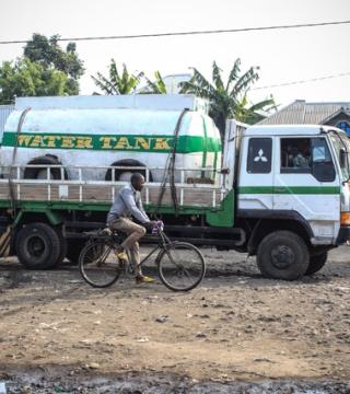 Truck delivering clean water to a displacement camp in DRC