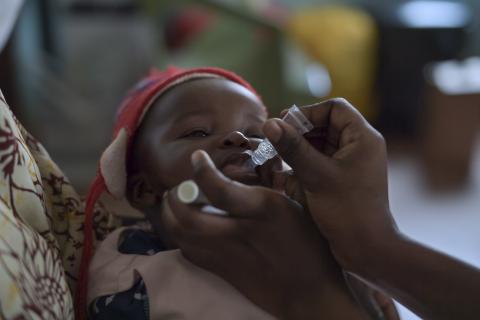 Baby in Kenya receives oral rotavirus vaccine